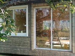 раздвижные окна и двери Slidors с теплым стеклопакетом